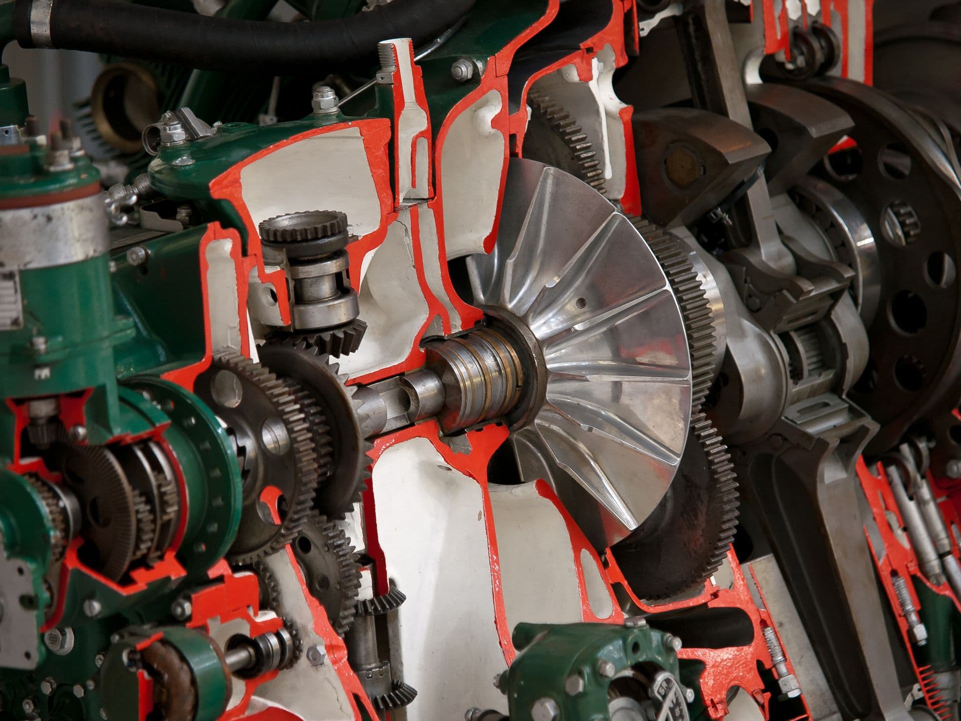 Cutaway view of a precision gear and shaft assembly inside a mechanical drivetrain