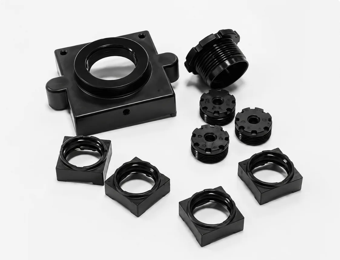 Black injection molded camera mount components