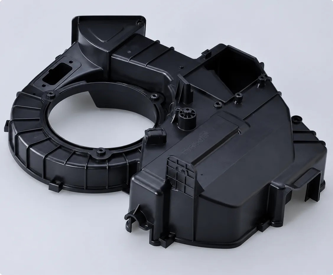 Black injection molded automotive blower housing