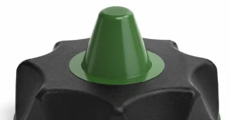 Green molded cone on a textured black knob