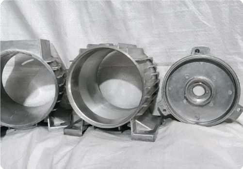 Cast aluminum cylindrical housings and a cover plate