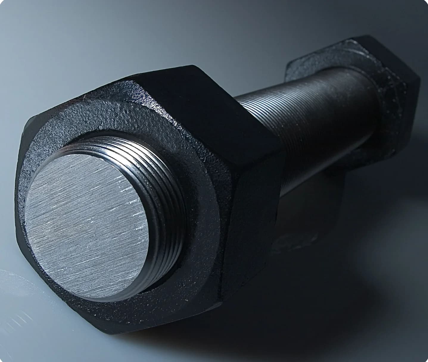 Large cast steel bolt with hex nut
